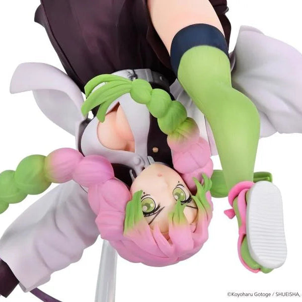 Close-up of Mitsuri Kanroji Aerial figure showing her face and pink-green hair